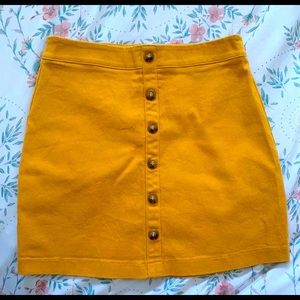 Bright Yellow short skirt .